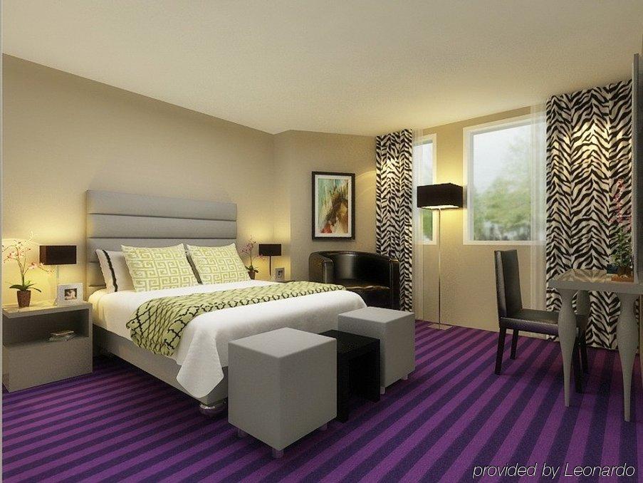 Executive Hotel Paris Женвил Екстериор снимка